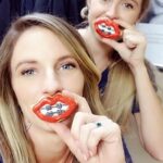 Eagle Dental with braces and lips cookie over mouth